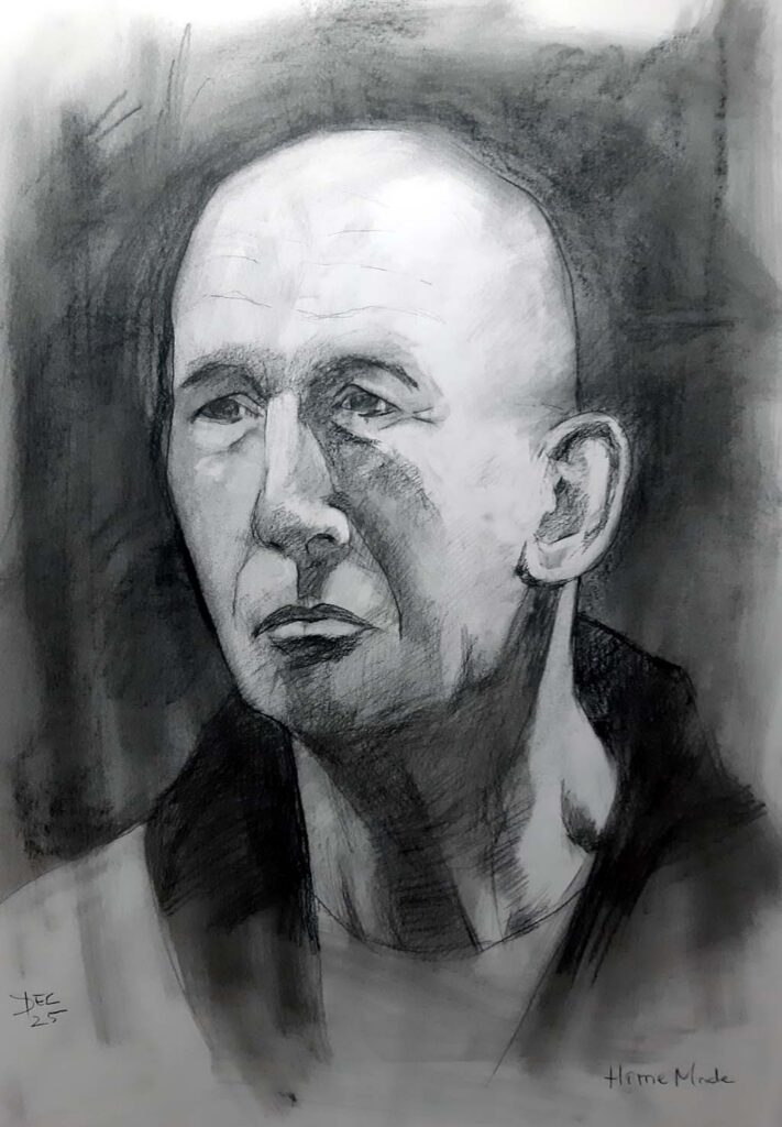 Tekening met houtskool naar een foto van model Ivan (Academie Arendonk). Formaat ongeveer 50 x 65 cm.